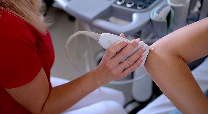 Point-of-care ultrasound scan performed in a home visit